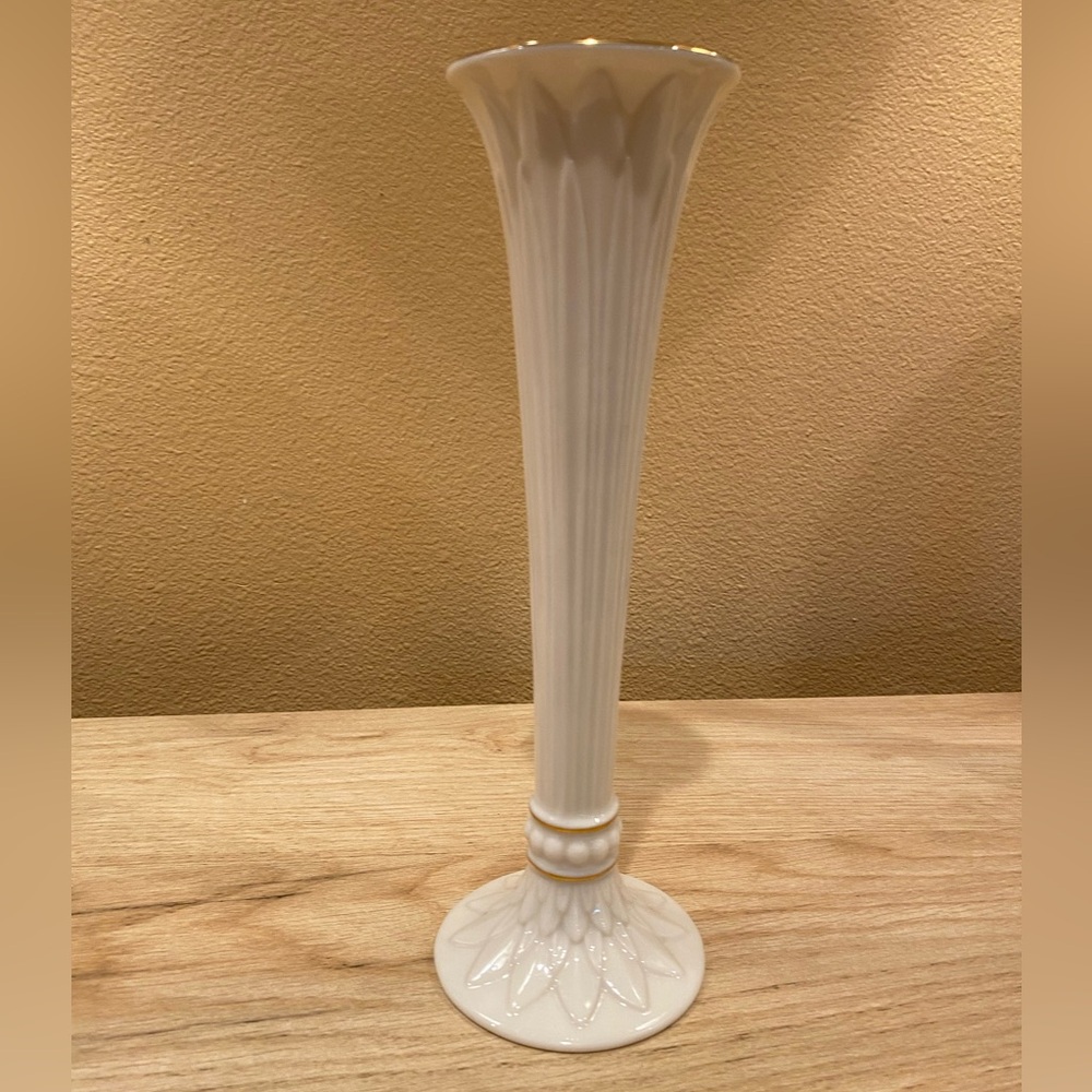 14 karat trimmed Lenox Bud Vase. Ivory in color excellent condition, beautiful.
